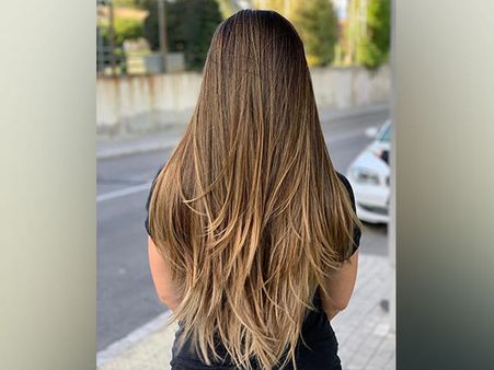 9. Blonde Balayage Hair With Crisp Layers