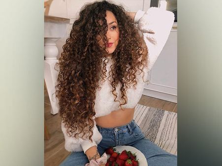 15. Side Swept Curls