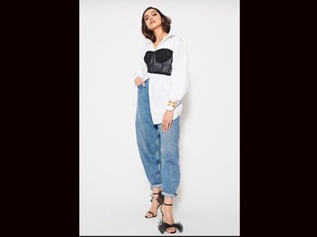 Deepika Padukone In A Black Corset Over White Shirt