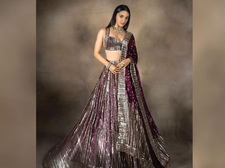Kiara Advani In A Plum Wine Metallic Lehenga