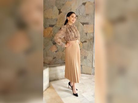 Madhuri Dixit In A Shimmering Top & Pleated Skirt