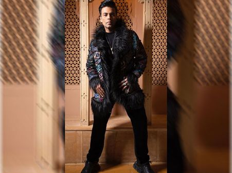 Karan Johar In A Printed Feather Jacket