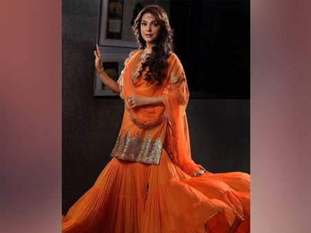 Juhi Chawla In An Orange Suit