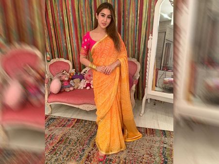Sara Ali Khan In A Yellow & Orange Printed Saree