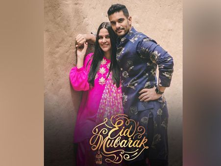 Neha Dhupia In A Pink Suit