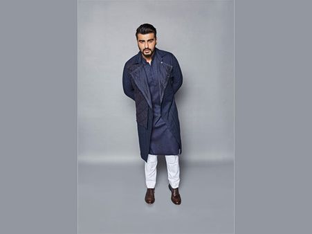Arjun Kapoor In A Blue Kurta And Trench Coat With White Pants