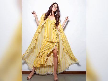 Kriti Sanon In A Yellow Striped Midi With Shrug