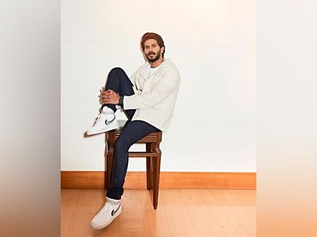 Dulquer Salmaan In A White Tee, Hoodie And Jeans