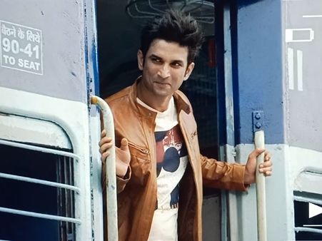 Sushant Singh Rajput In A Graphic Tee And Orange Jacket