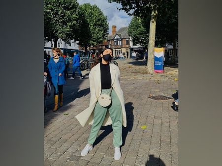 Parineeti Chopra In Top, Trousers And Trenchcoat