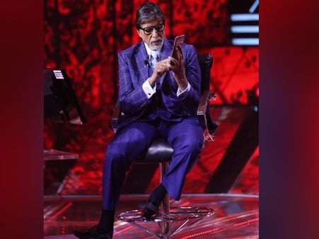 Amitabh Bachchan In A Red And White Checked Blue Pantsuit