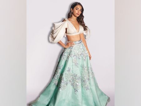 Pooja Hegde In A White Top And Long Green Skirt