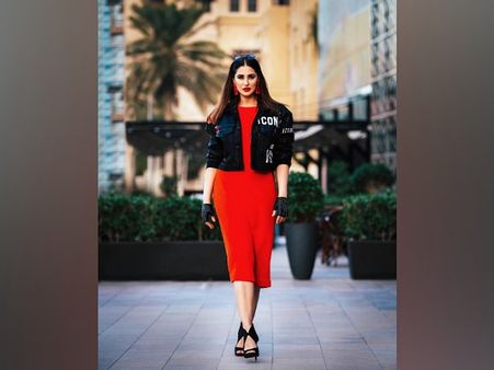 Nargis Fakhri In A Red Dress With Black Jacket