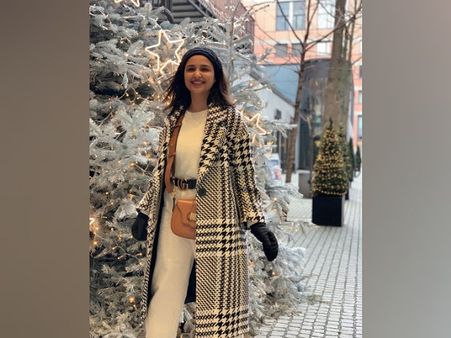 Parineeti Chopra In White Separates And Trenchcoat