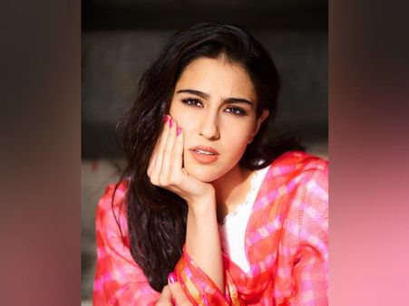 The Minimal Look Marked By Neutral Eye Shadow And Cherry Lip Shade