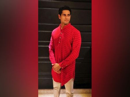 Sidharth Malhotra In A Red Kurta And Beige Bottoms
