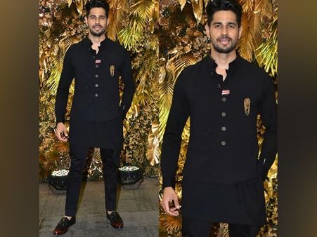 Sidharth Malhotra In A Black Bandhgala Suit