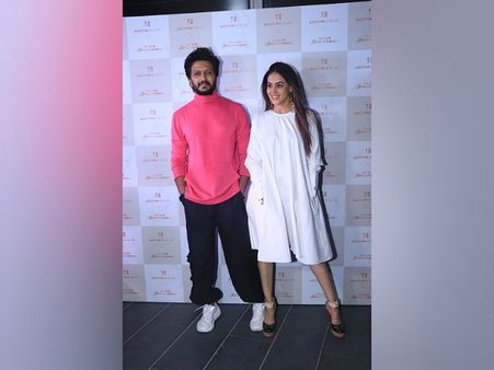 Riteish Deshmukh In Pink And Genelia D’Souza In White Riteish Deshmukh In Pink And Genelia D’Souza In White