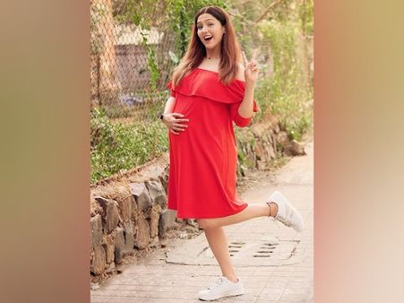 Neeti Mohan In An Off-Shoulder Red Dress