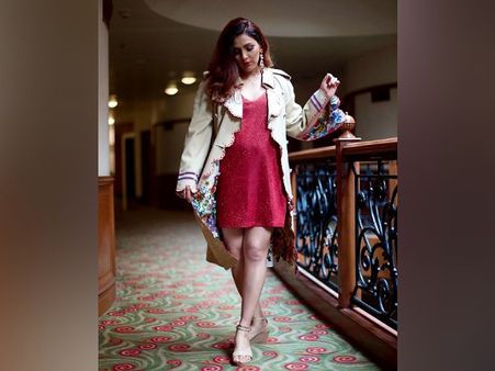 Neeti Mohan In A Sequin Dress And Overcoat
