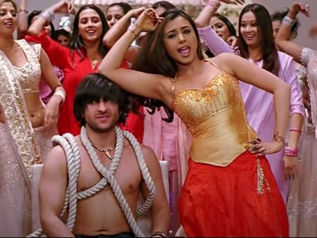 Rani Mukerji In A Golden Choli And Red Skirt