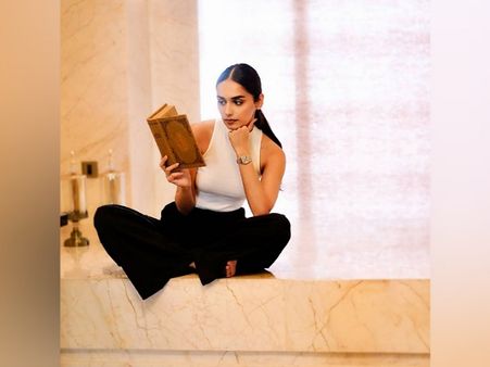 Manushi Chhillar In A White Top And Black Pants