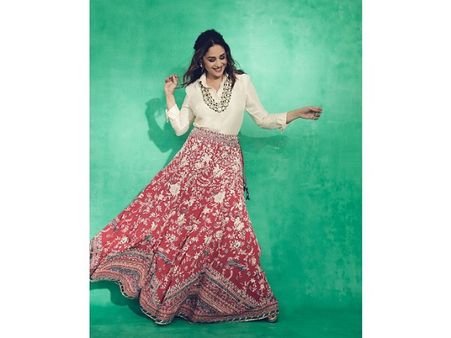 Madhuri Dixit In A White Shirt And Red Skirt