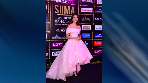 Pooja Hegde in an off-shoulder White Gown