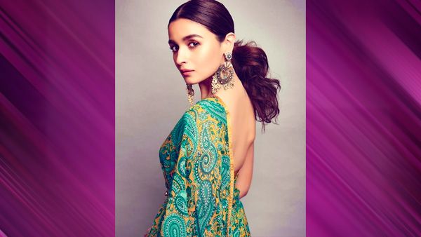 1. Sleek Ponytail With Curling Strands