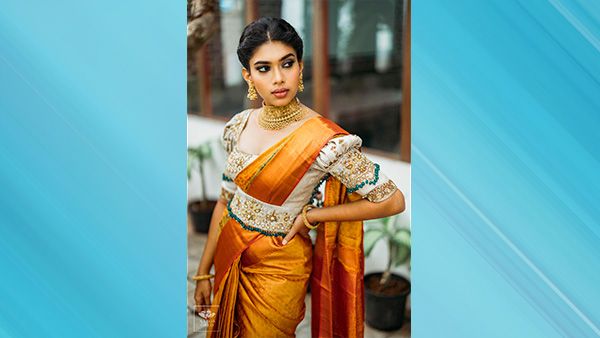 Dushara in Orange Kanchi Pattu Saree