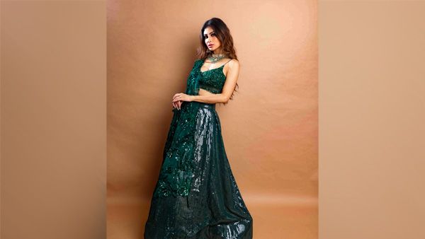 Mouni Roy in Peacock Green Lehenga