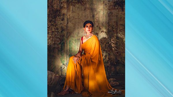 Dushara in Contemporary Yellow Saree