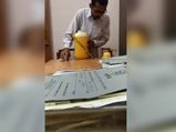 अलीगढ़ के चपरासी का महिला जज के पानी में थूकने का वीडियो हुआ वायरल 