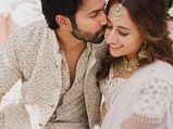 वरूण धवन और नताशा दलाल की मेहंदी सेरेमनी की फोटो, व्हाइट आउटफिट में लग रहे हैं दोनों स्टनिंग