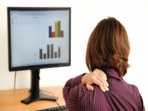 sitting at a computer