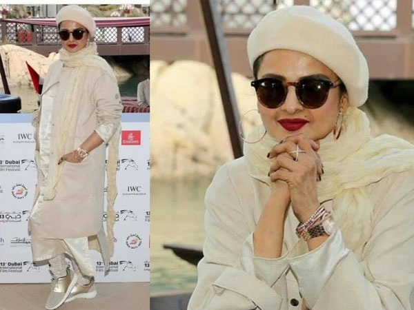 ऑफ व्हाइट कलर कुर्ती और सिल्वर शूज में रेखा