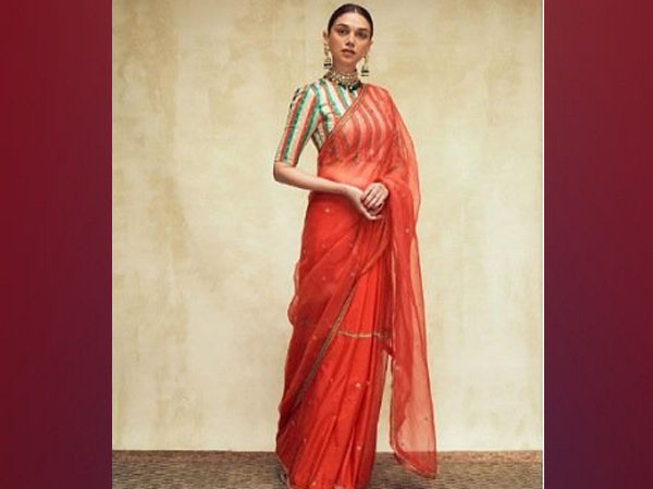 Aditi Rao Hydari Looks Stunning In Red Saree And Striped Blouse