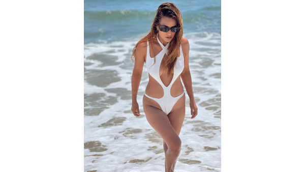 Nia Sharma Looks Sexy in Sultry White Cut-Out Monokini