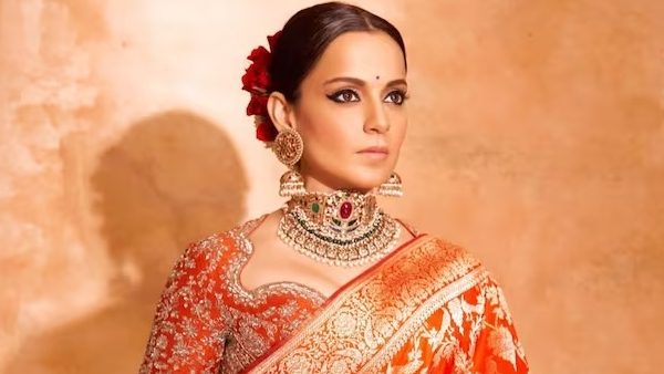 Kangana Ranaut’s Wore multi-curve Blouse with Rust Banarasi Kangana Ranaut’s Wore multi-curve Blouse with Rust Banarasi