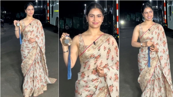 Olympic Medalist Manu Bhaker Dazzles in Ivory Saree on KBC 16