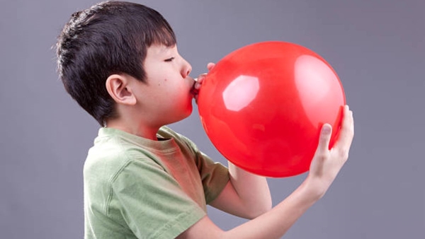 13 Yr boy died from choking on balloons