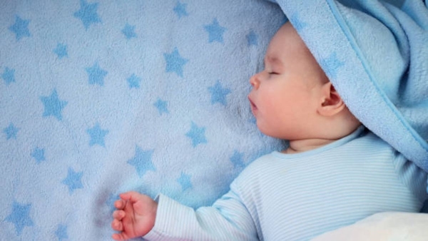 Why babies remove blanket at night
