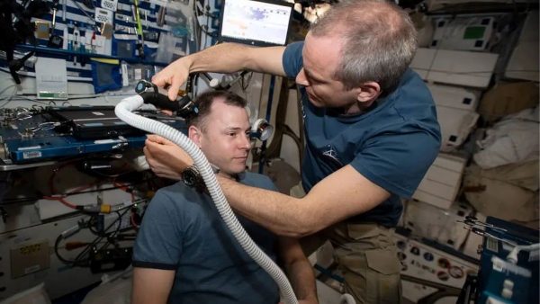 How do astronauts shave and cut their hair