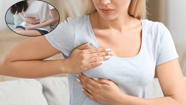 periods se pahle breast pain
