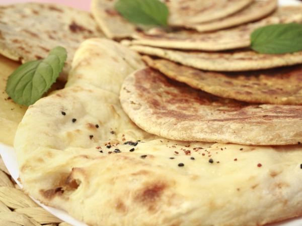 This morning lets try out something healthy and vegetarian! The mushroom and peas paratha is one of the best combination you can have for your breakfast. Mushroom becomes extremely delicious and tasty when you add a list of Indian spices to it. It is also a healthy ingredient for those who are on a weight loss program, as it contains very small amount of calories. This mushroom and peas paratha recipe for breakfast is easy to make and best for working women as it is hardly time consuming. It is a delicious recipe to try out this morning. If you want to start your morning on a healthy note, then this is the best breakfast recipe to try out. Take a look at the mushroom and peas paratha recipe which is given below. Serves: 2 Preparation Time: 15 minutes Cooking Time: 20 minutes Ingredients Wheat flour– 2 cups Mushrooms– ½ cup (chopped) Paneer– 5tbsp (crumbled) Green peas– 3tbsp (boiled) Green chillies– 2tsp (grated) Ginger– 1tsp (grated) Curd– ½ cup Salt- as per taste Water- 3/4th cup (for kneading) Method You first need to prepare the dough out of wheat flour using a correct proportion of water. Make the dough a little soft and keep it aside. When the dough become a little tight, add in the chopped mushroom, grated chillies and ginger to the dough. Knead the dough together and mix all the ingredients well. Now add in the curd, green peas, paneer and salt to the dough. Knead the ingredients well. When the dough is ready with all the added ingredients, roll out the dough to make a round shape. When the shape is ready, take a frying pan and make it hot on a medium flame. When the frying pan is hot, pour a drop of oil on the pan and place the paratha on the pan. Fry the paratha till it turns golden-brown in colour. Then flip the paratha on the other side and repeat the process. After the paratha is cooked on both sides, serve it on a plate. Your mushroom and peas paratha is now ready to eat. Enjoy this with ketchup of your choice. This morning lets try out something healthy and vegetarian! The mushroom and peas paratha is one of the best combination you can have for your breakfast. Mushroom becomes extremely delicious and tasty when you add a list of Indian spices to it. It is also a healthy ingredient for those who are on a weight loss program, as it contains very small amount of calories. This mushroom and peas paratha recipe for breakfast is easy to make and best for working women as it is hardly time consuming. It is a delicious recipe to try out this morning. If you want to start your morning on a healthy note, then this is the best breakfast recipe to try out. Take a look at the mushroom and peas paratha recipe which is given below. Serves: 2 Preparation Time: 15 minutes Cooking Time: 20 minutes Ingredients Wheat flour– 2 cups Mushrooms– ½ cup (chopped) Paneer– 5tbsp (crumbled) Green peas– 3tbsp (boiled) Green chillies– 2tsp (grated) Ginger– 1tsp (grated) Curd– ½ cup Salt- as per taste Water- 3/4th cup (for kneading) Method You first need to prepare the dough out of wheat flour using a correct proportion of water. Make the dough a little soft and keep it aside. When the dough become a little tight, add in the chopped mushroom, grated chillies and ginger to the dough. Knead the dough together and mix all the ingredients well. Now add in the curd, green peas, paneer and salt to the dough. Knead the ingredients well. When the dough is ready with all the added ingredients, roll out the dough to make a round shape. When the shape is ready, take a frying pan and make it hot on a medium flame. When the frying pan is hot, pour a drop of oil on the pan and place the paratha on the pan. Fry the paratha till it turns golden-brown in colour. Then flip the paratha on the other side and repeat the process. After the paratha is cooked on both sides, serve it on a plate. Your mushroom and peas paratha is now ready to eat. Enjoy this with ketchup of your choice.