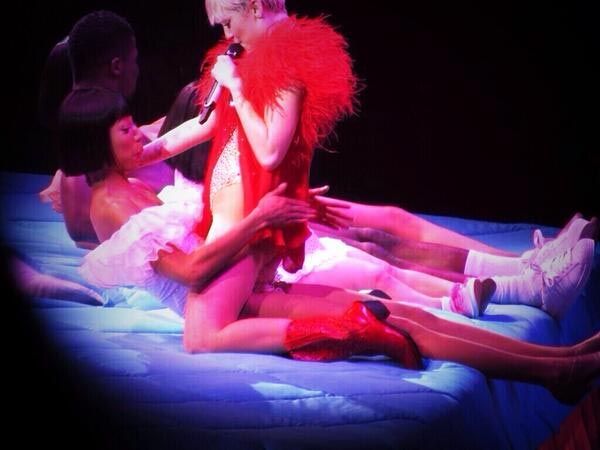 Straddling A Dancer in Red