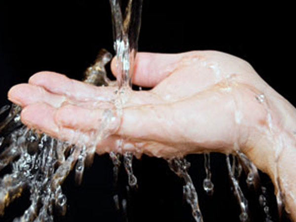 Washing hair with hard water