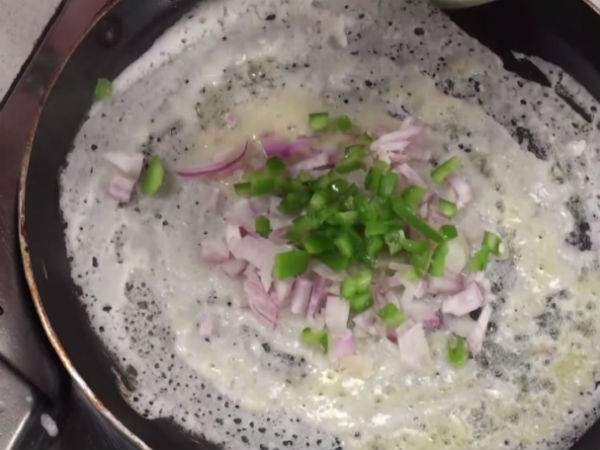 add the cjopped onions to the dosa