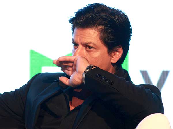 SRK in black blazer