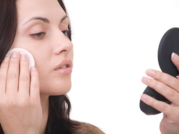 Covering Pimples With Bright Concealer